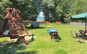 Słońce i Woda - 2 domki nad brzegiem jeziora Śniardwy z własnym pomostem, zejściem do wody i przecudnym widokiem na jezioro